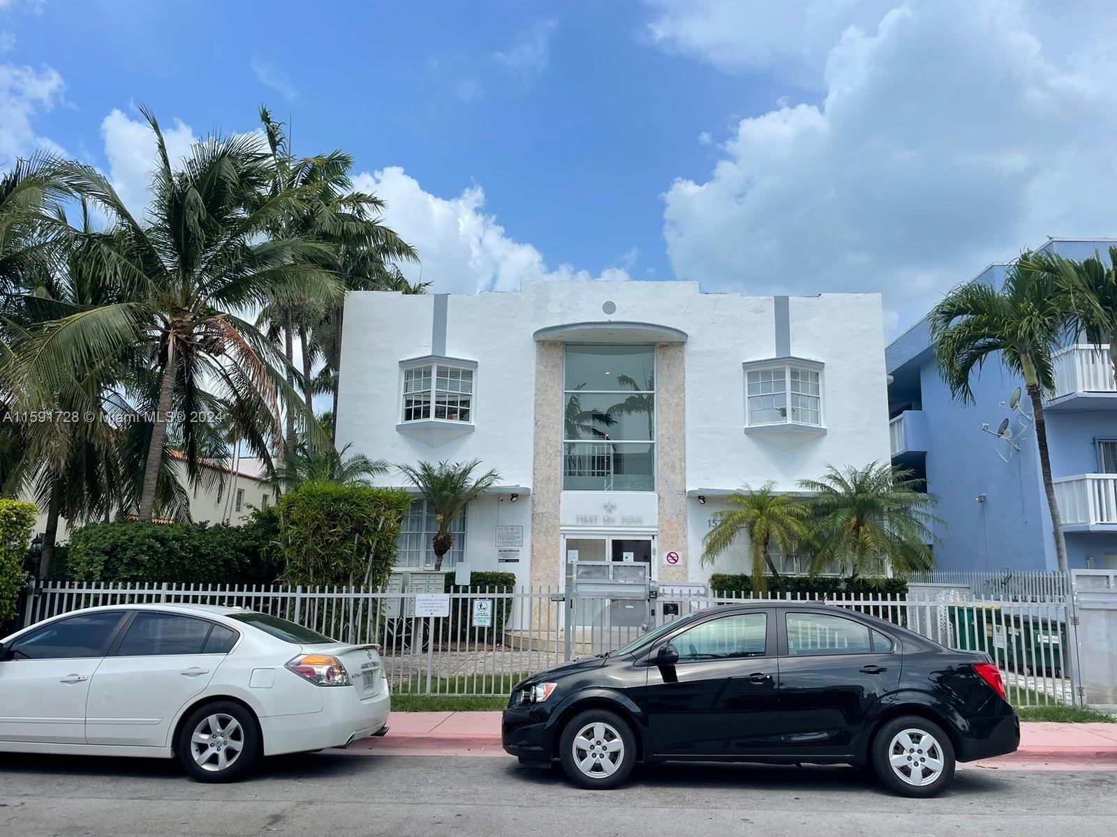 a car parked in front of a building