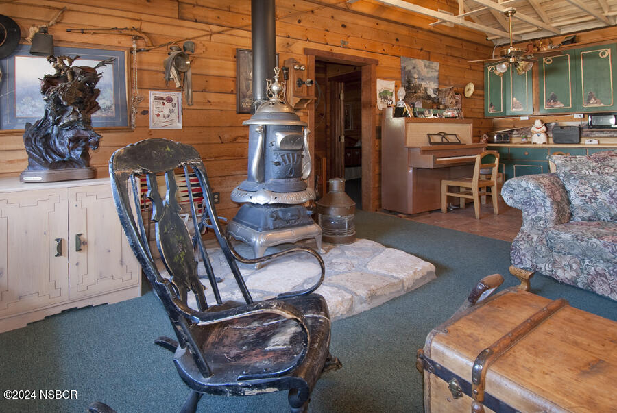 a view of a livingroom with furniture and windows