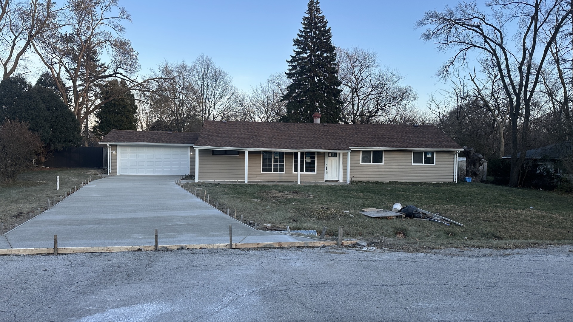 front view of a house with a yard