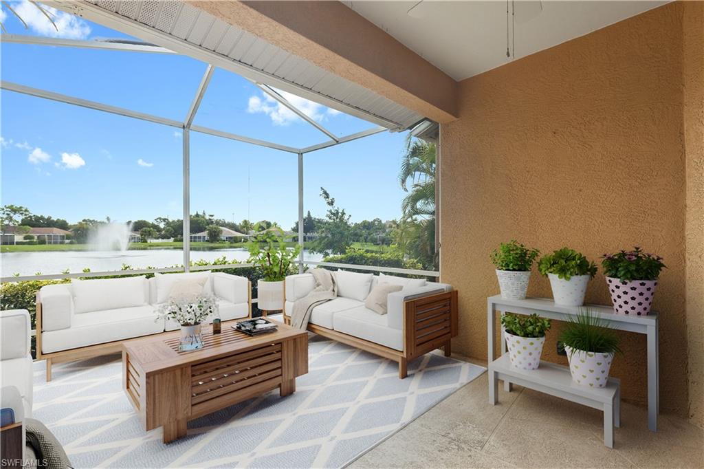 a building outdoor space with patio couch and glass windows