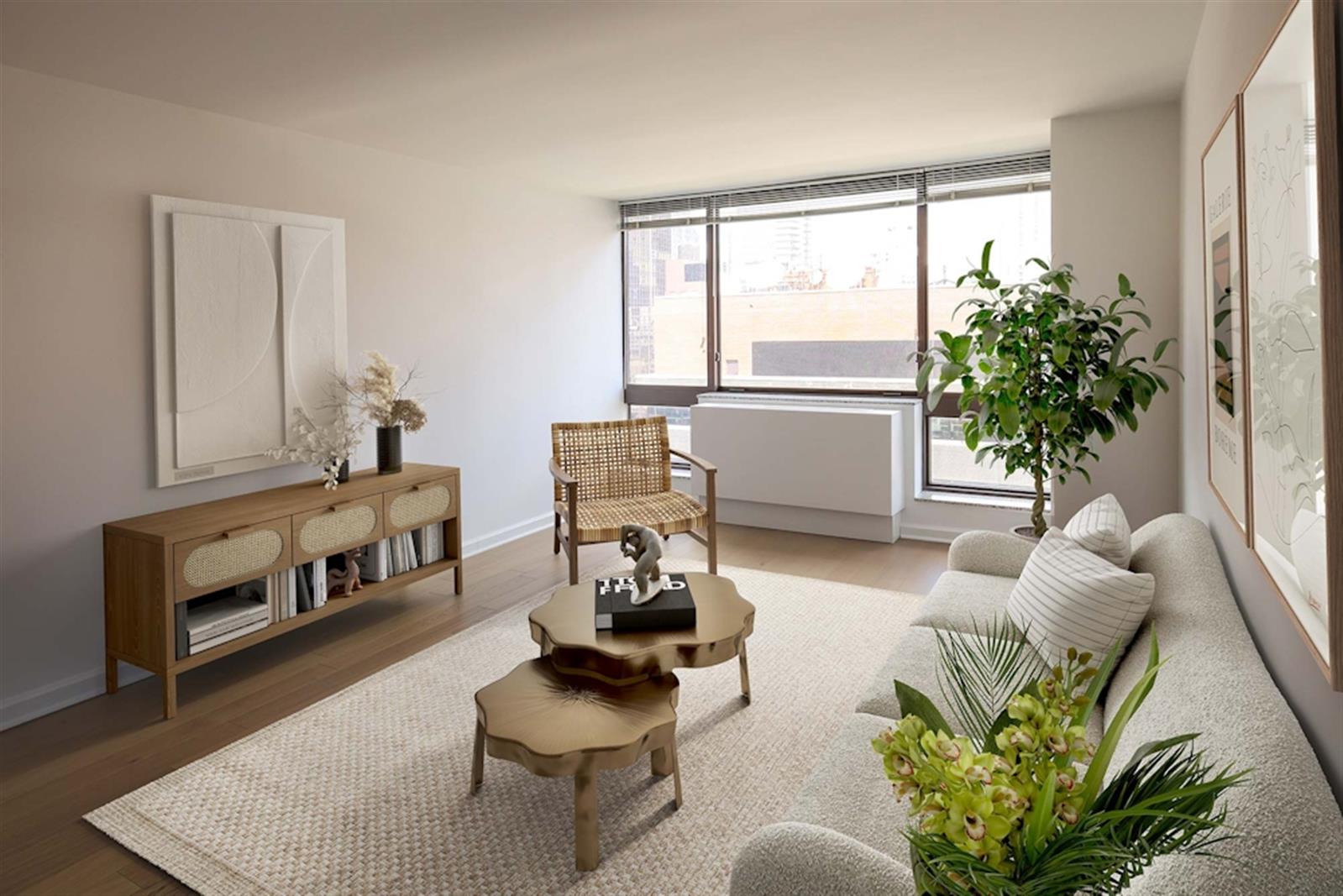 a living room with furniture and a potted plant