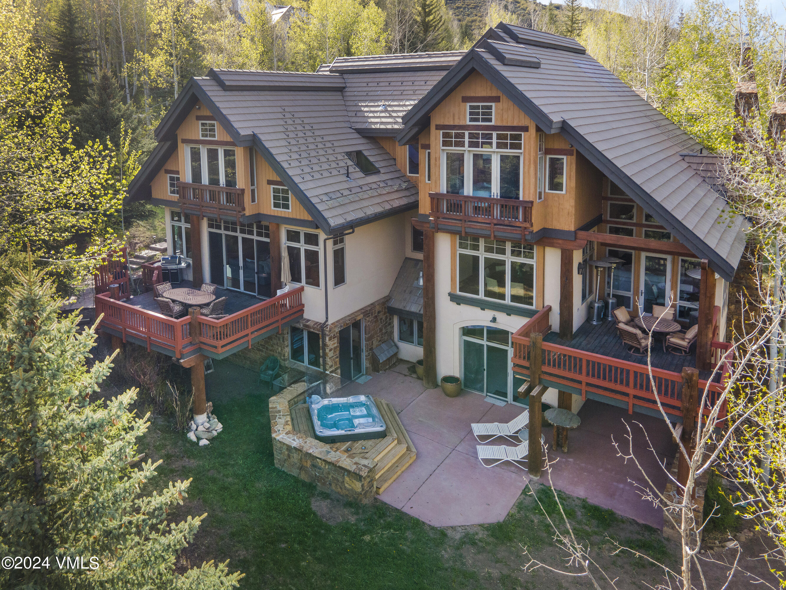 a aerial view of a house with a yard