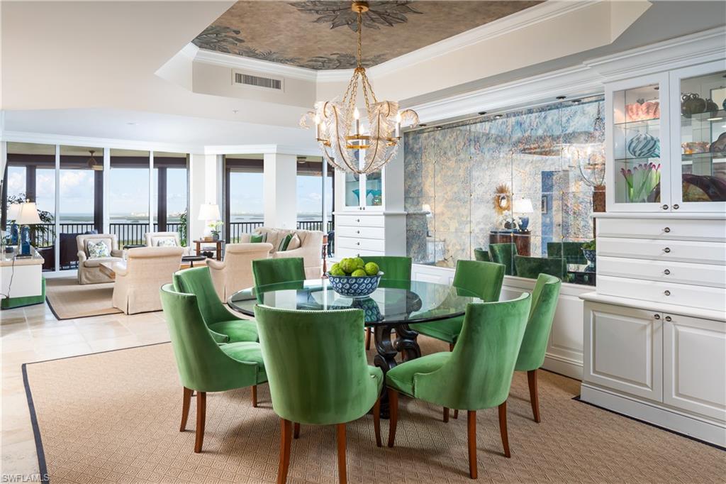 a view of a dining room with furniture window and outside view