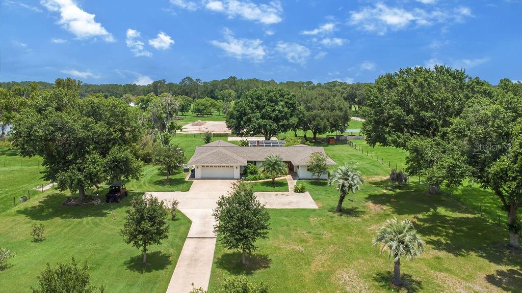 a view of a lake with a yard