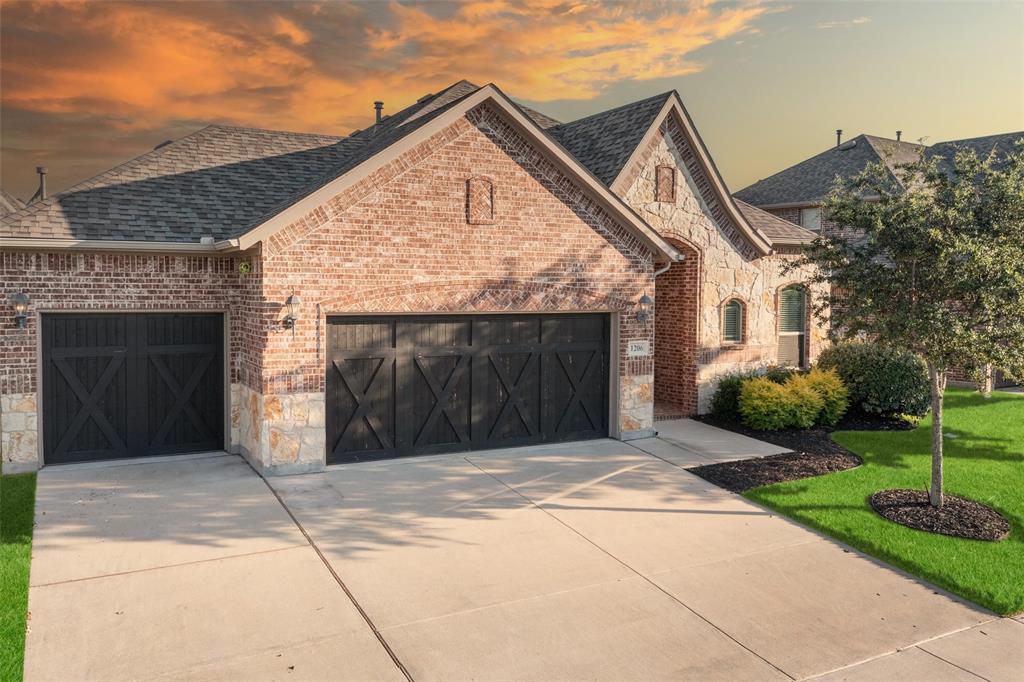 a front view of a house with yard