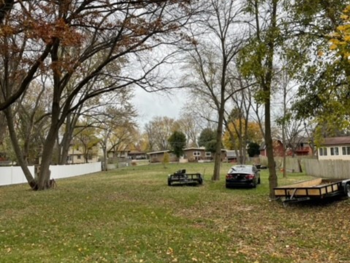 a view of car parked on the side of a road