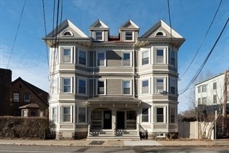 a view of multiple houses with a street