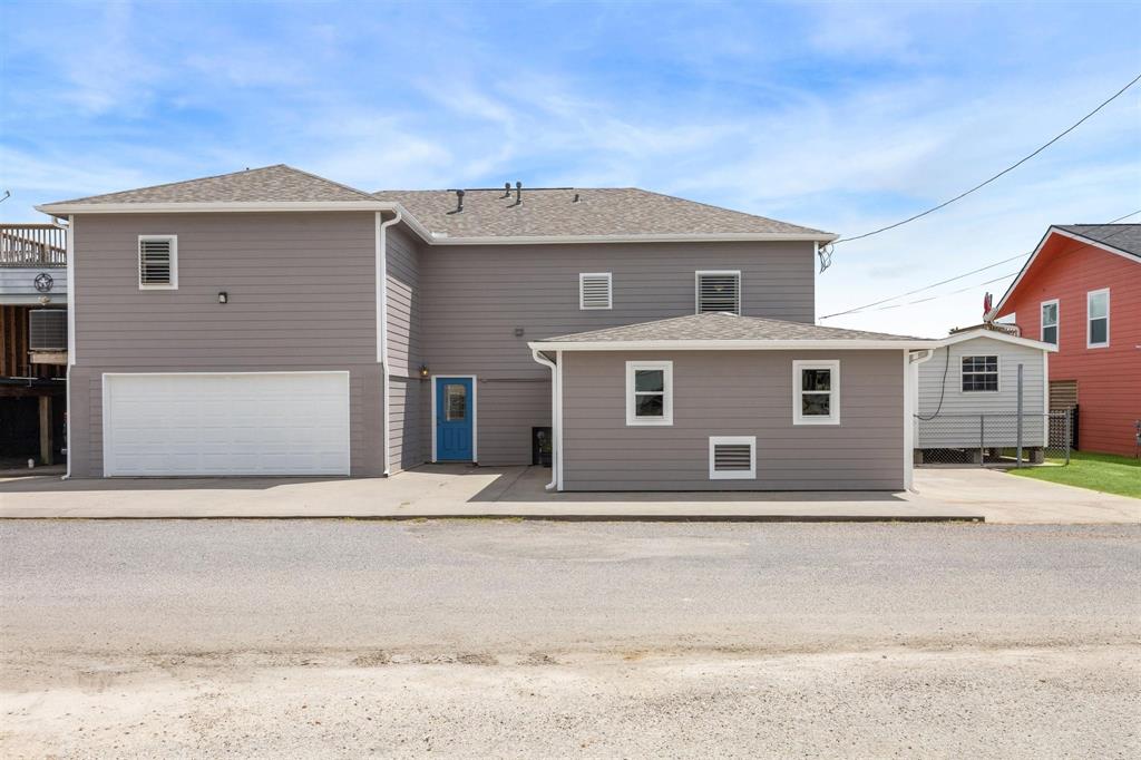 a front view of a house with a garage