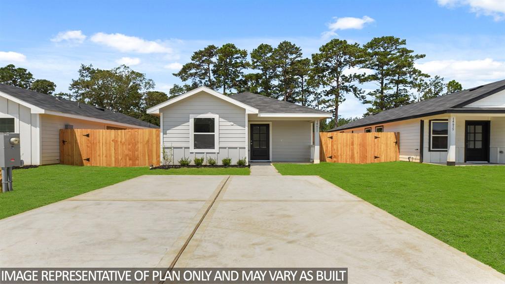 a view of outdoor space yard and garage