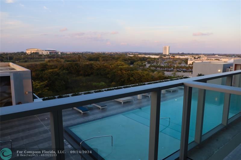 a view of a balcony with city view