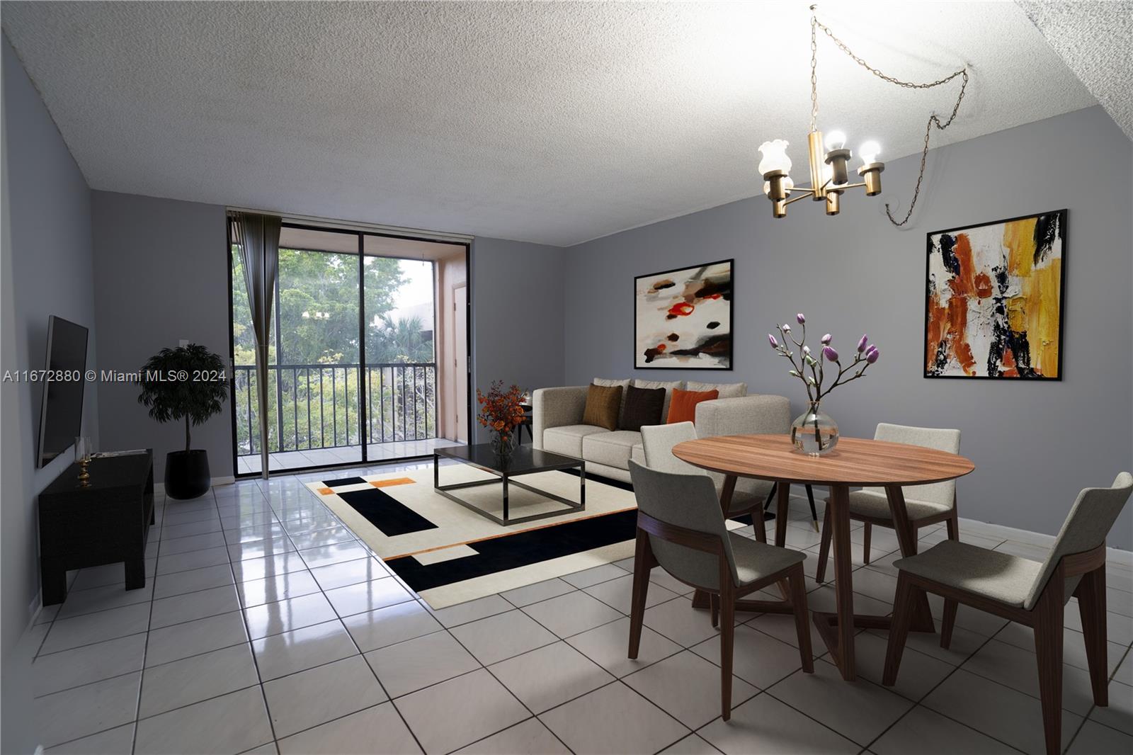 a living room with furniture a chandelier and a table