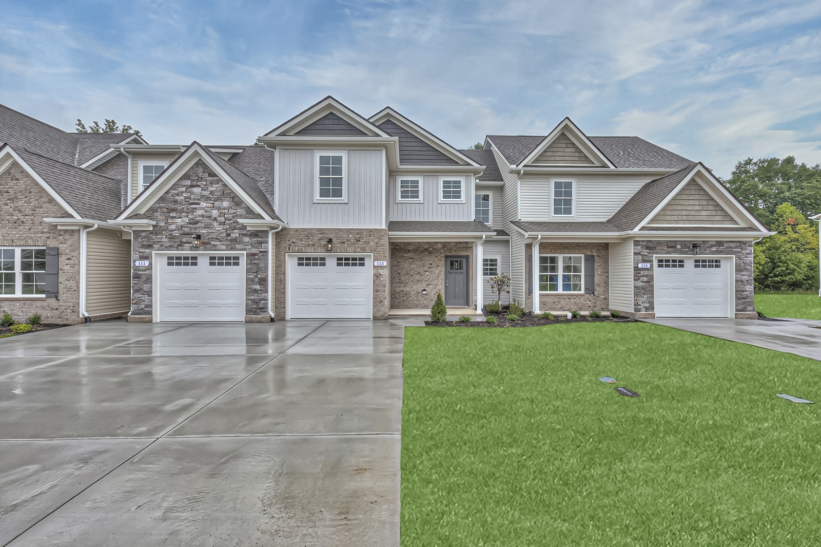 front view of a house with a yard