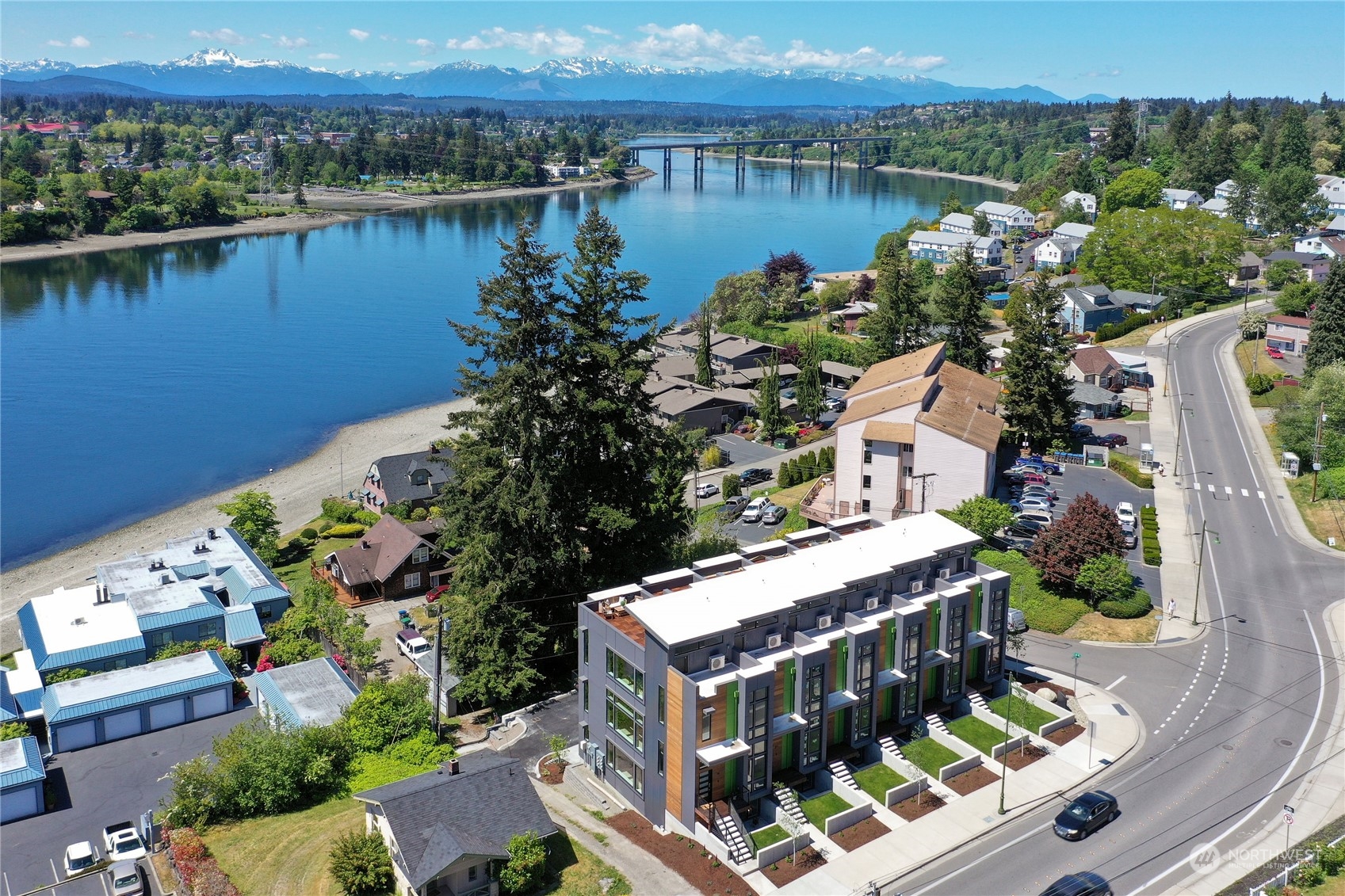 aerial view of a house with a lake view