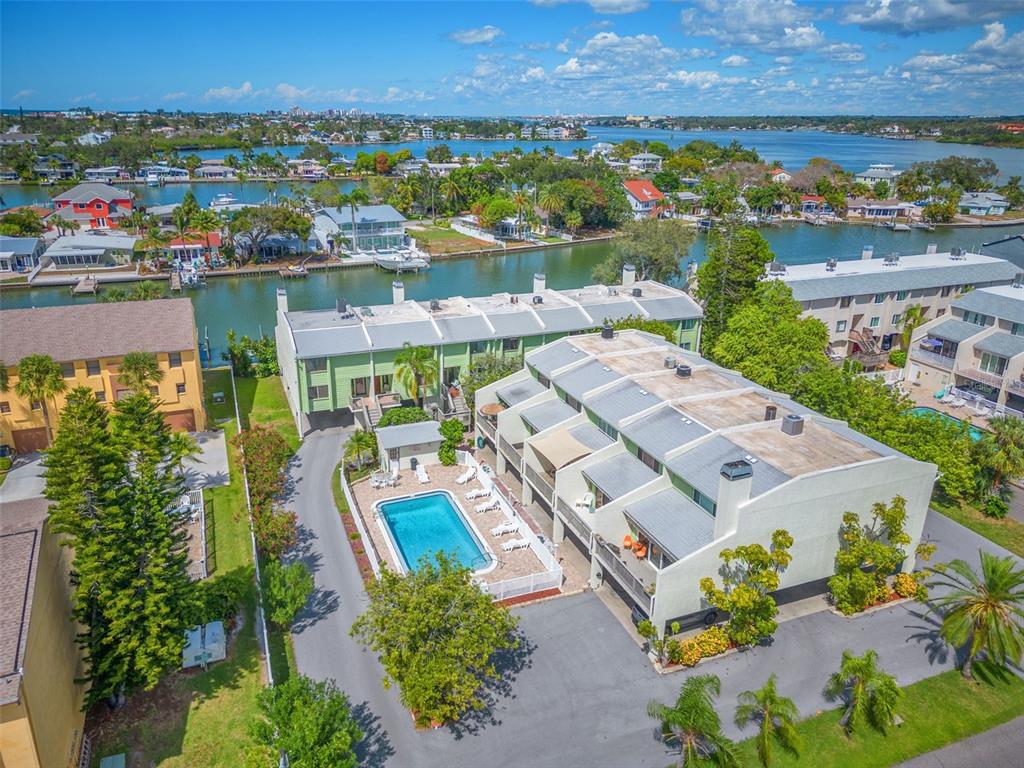 an aerial view of a house with a ocean view