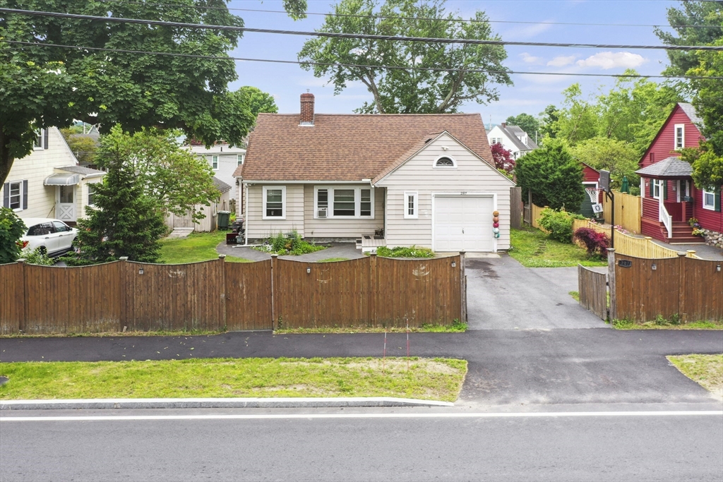 a house view with a garden space