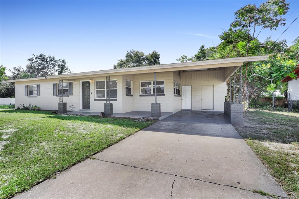 front view of a house with a yard