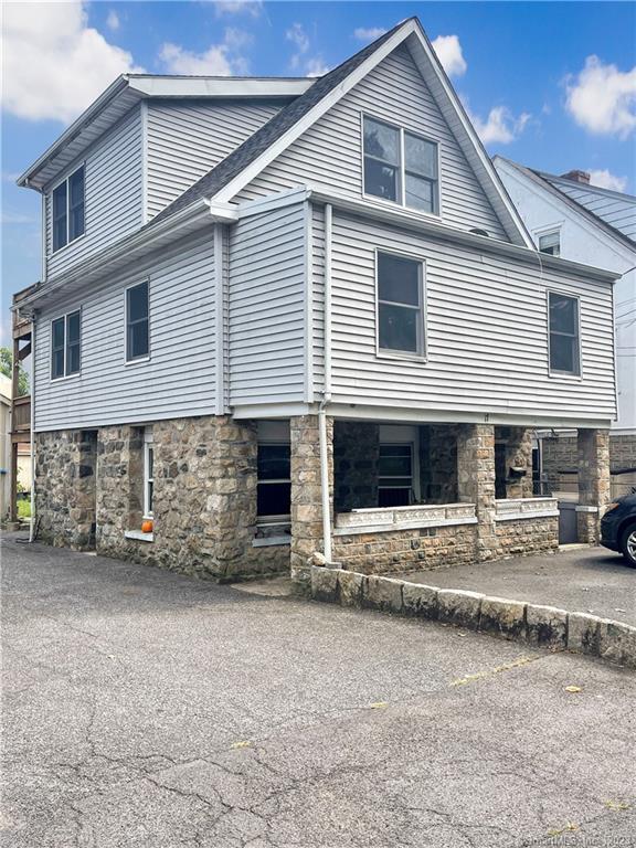 a front view of a house with a garage