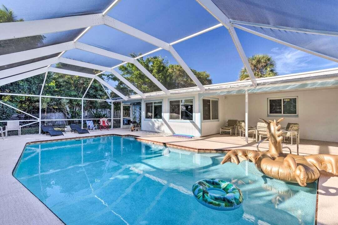 a view of a swimming pool with a patio