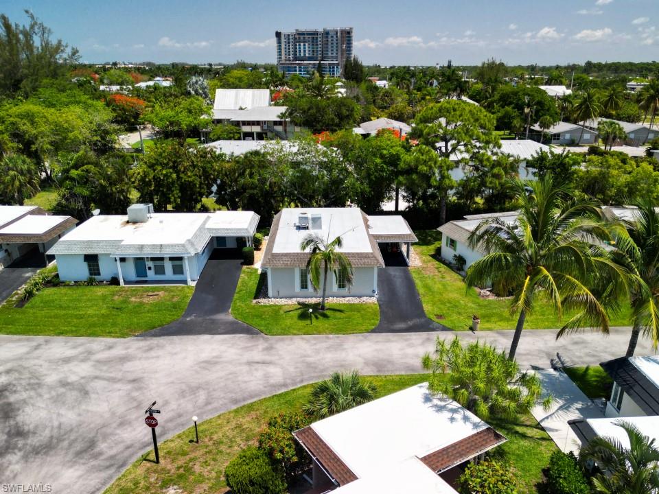 an aerial view of a house with a garden