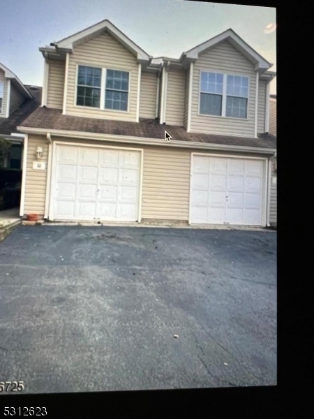 a view of a house with a outdoor space