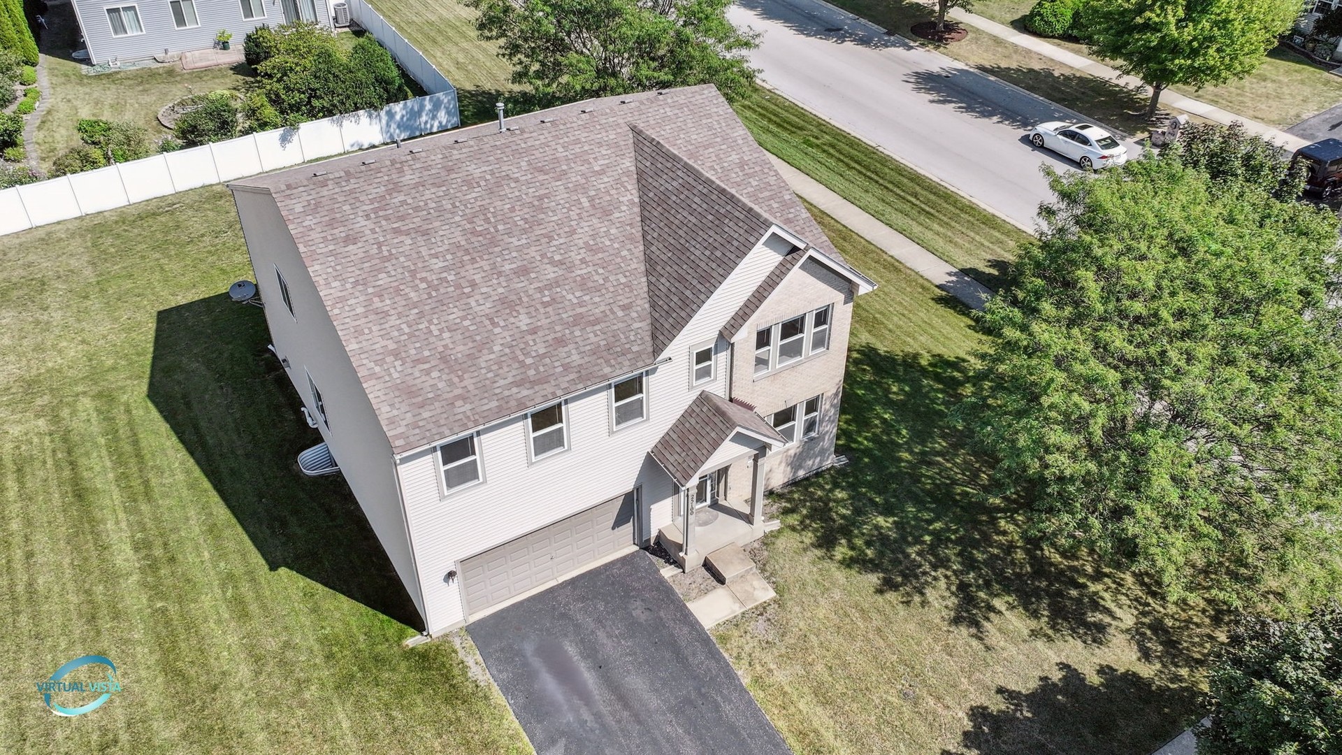 an aerial view of a house with balcony