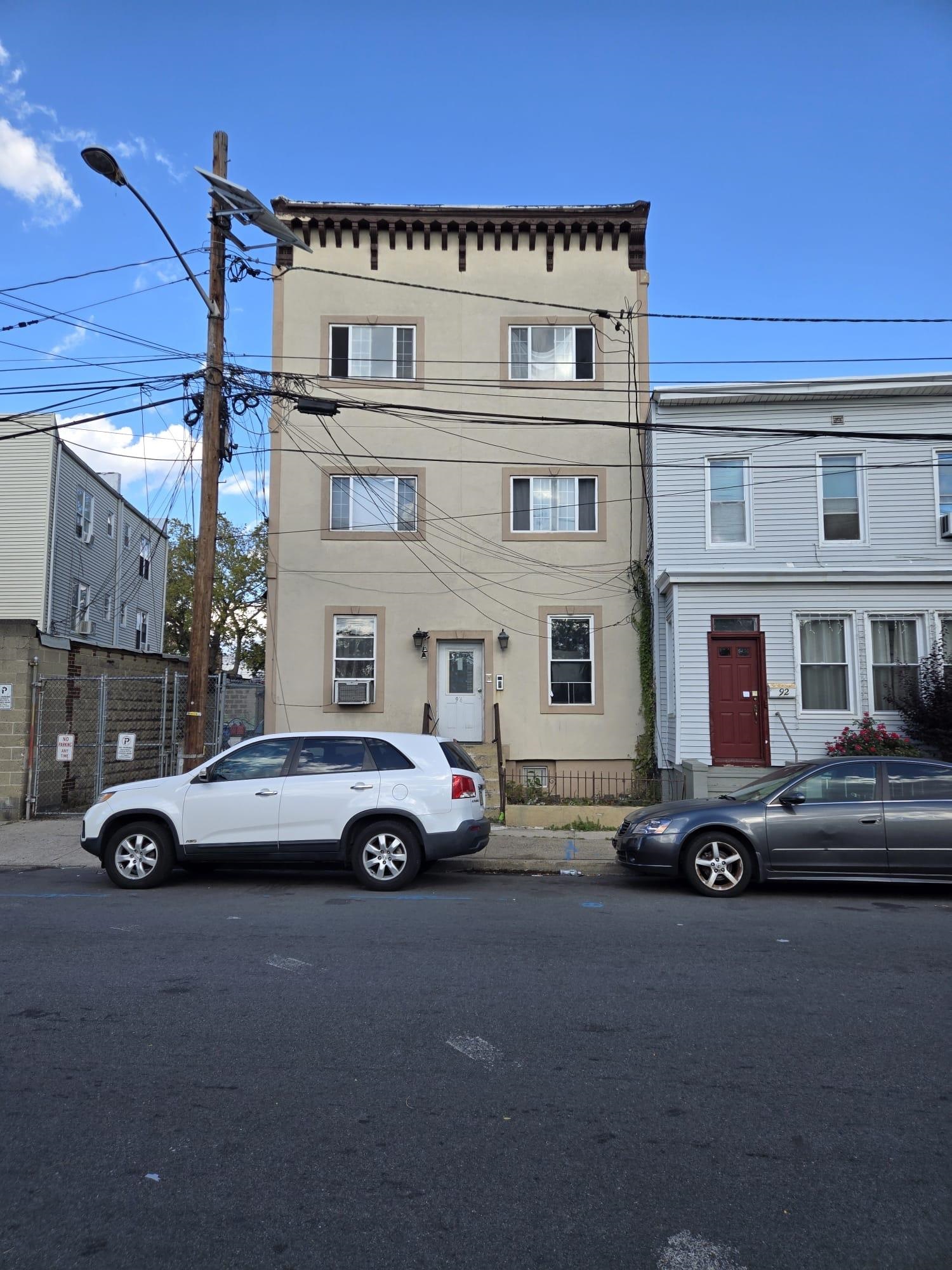 a car parked in front of a building