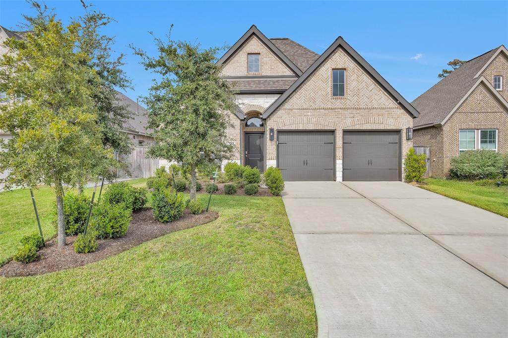 front view of a house and a yard