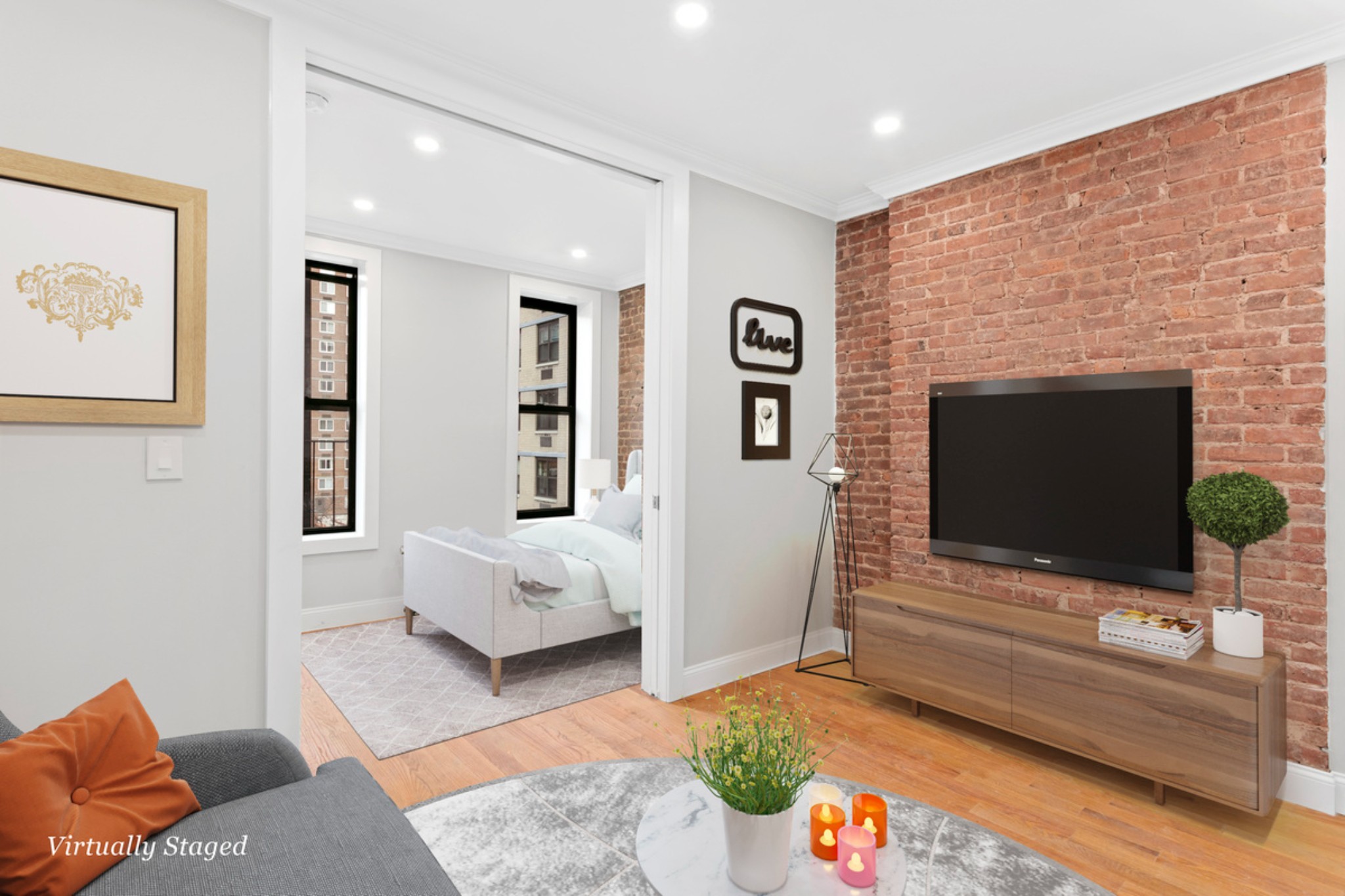 a living room with furniture and a flat screen tv