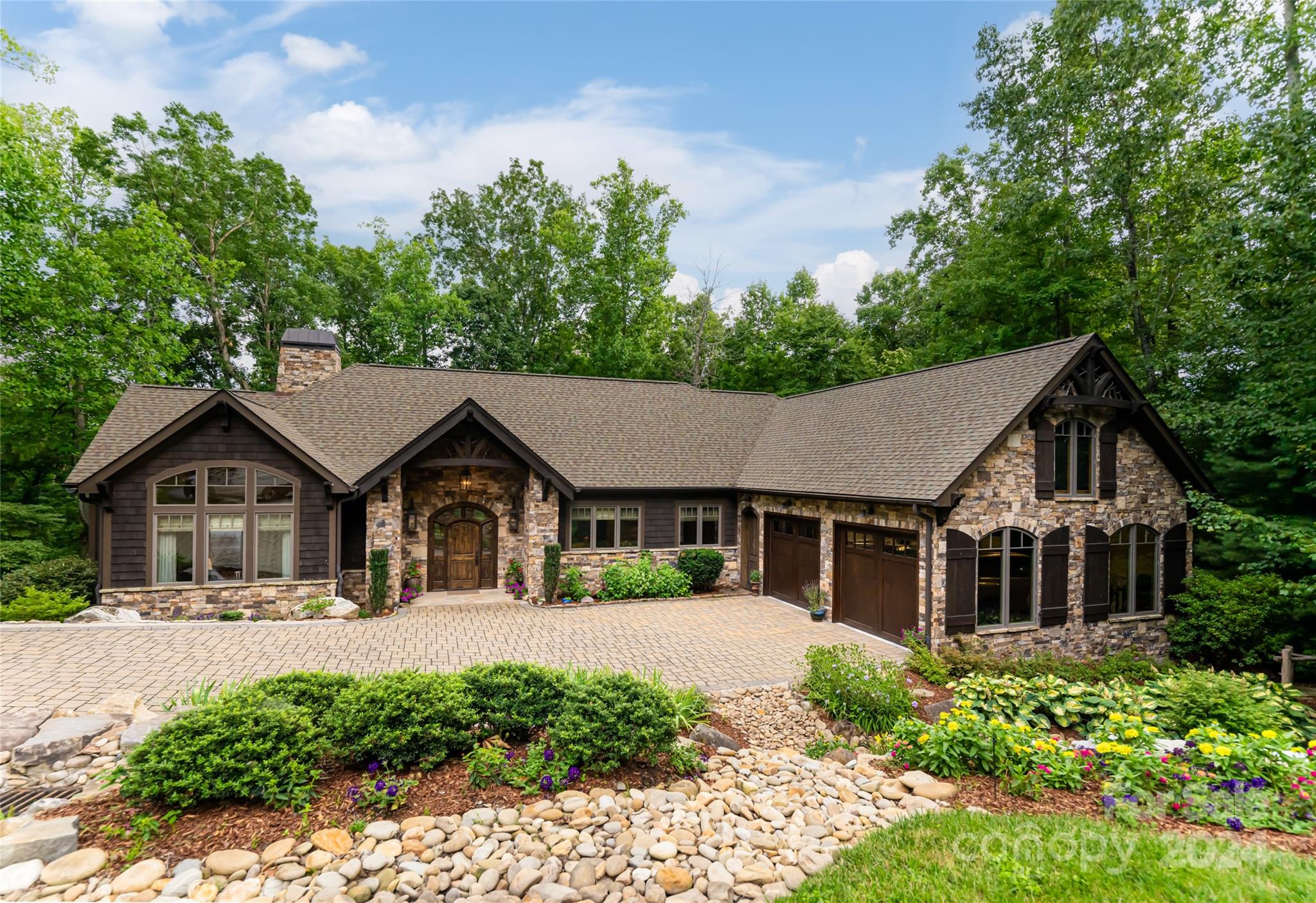 a house with trees in the background