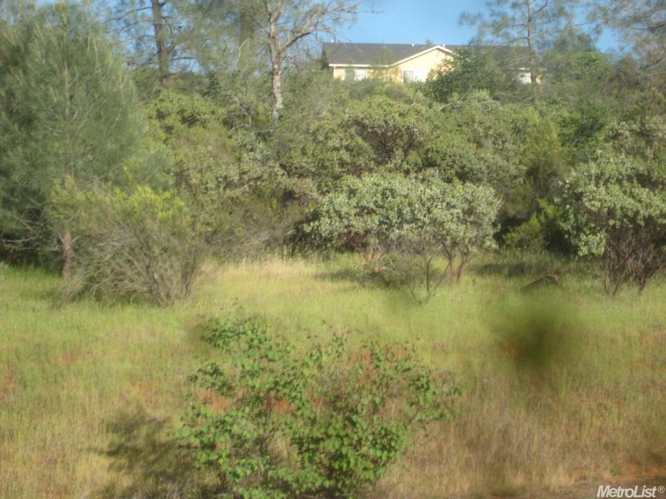 a view of residential houses with lake view