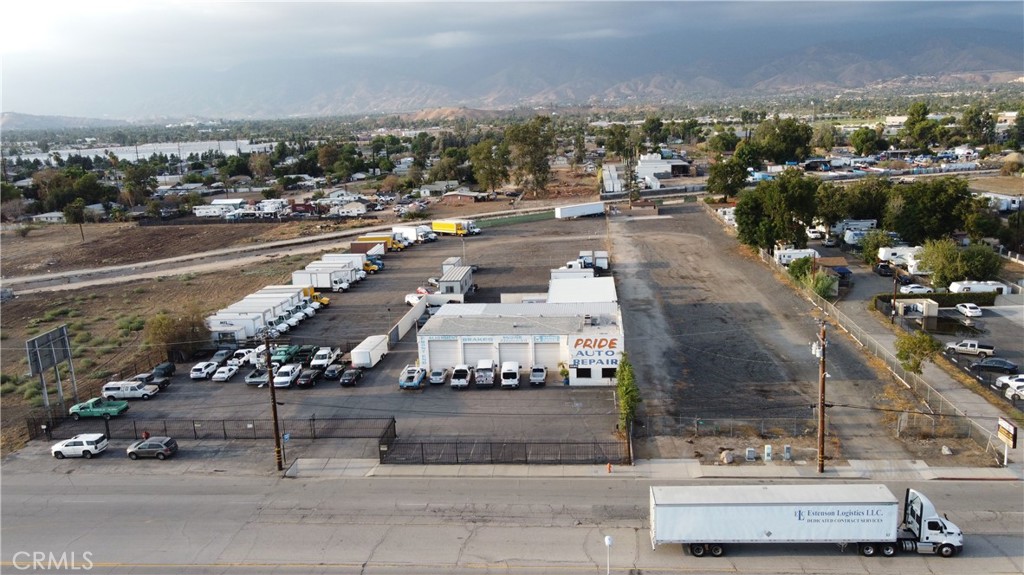 an aerial view of a parking and tree