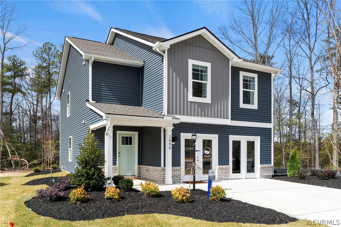 View of front of home featuring covered porch