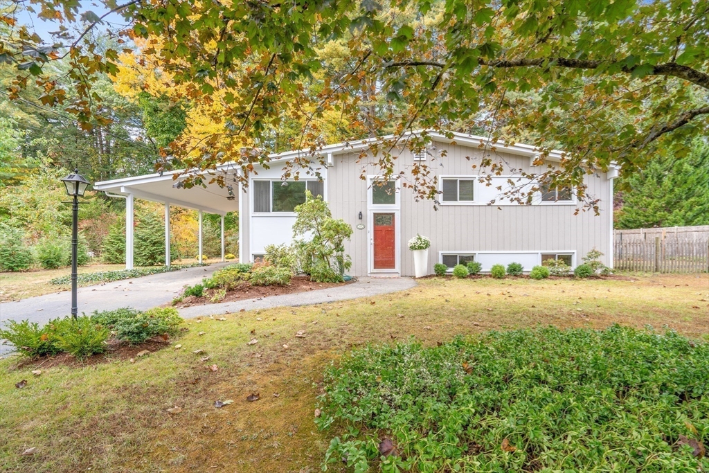 front view of a house with a big yard