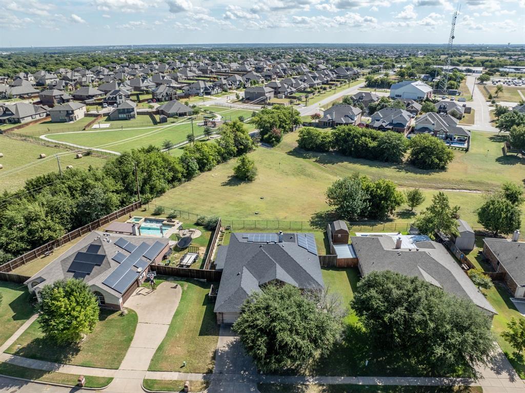 an aerial view of a house with a garden