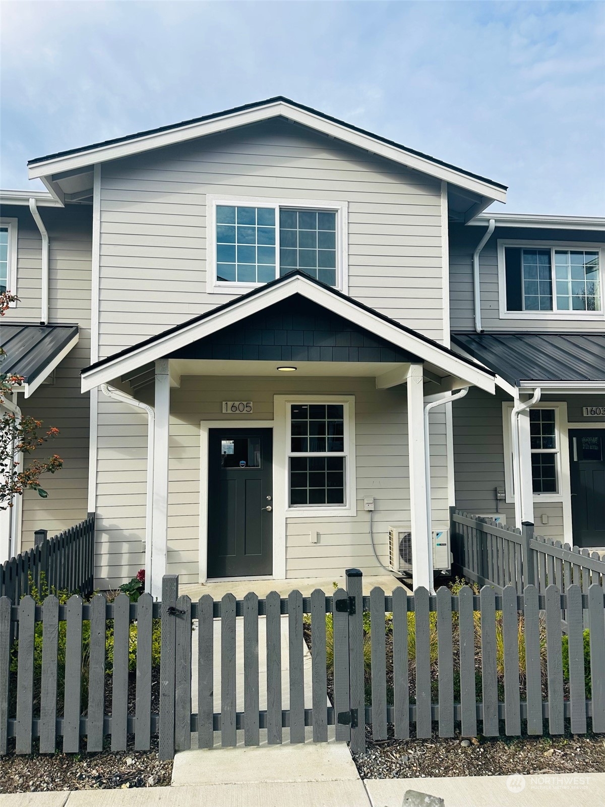 a front view of a house with a porch