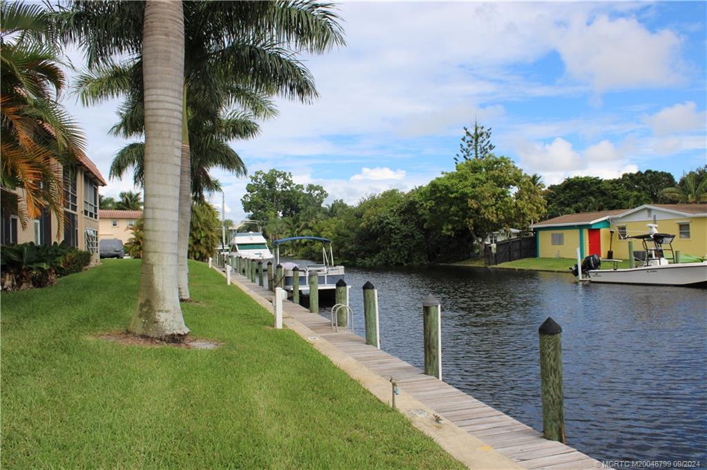 a view of a lake with a building in the background