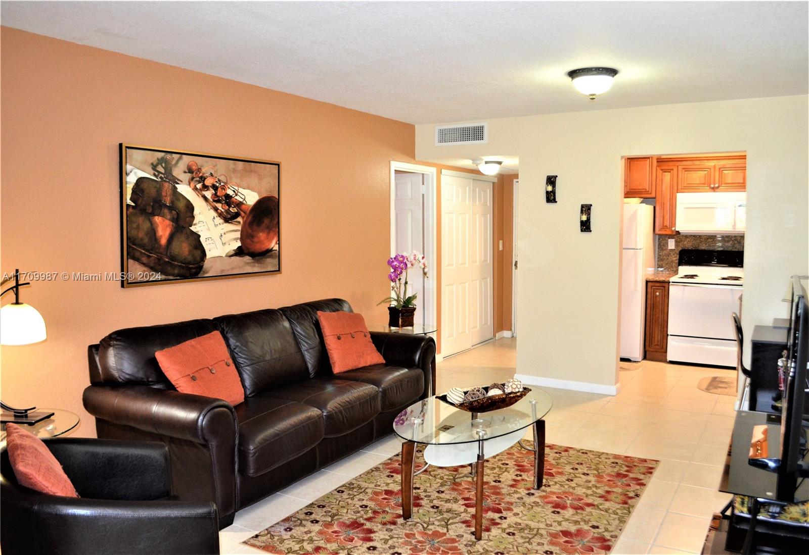 a living room with furniture and a couch