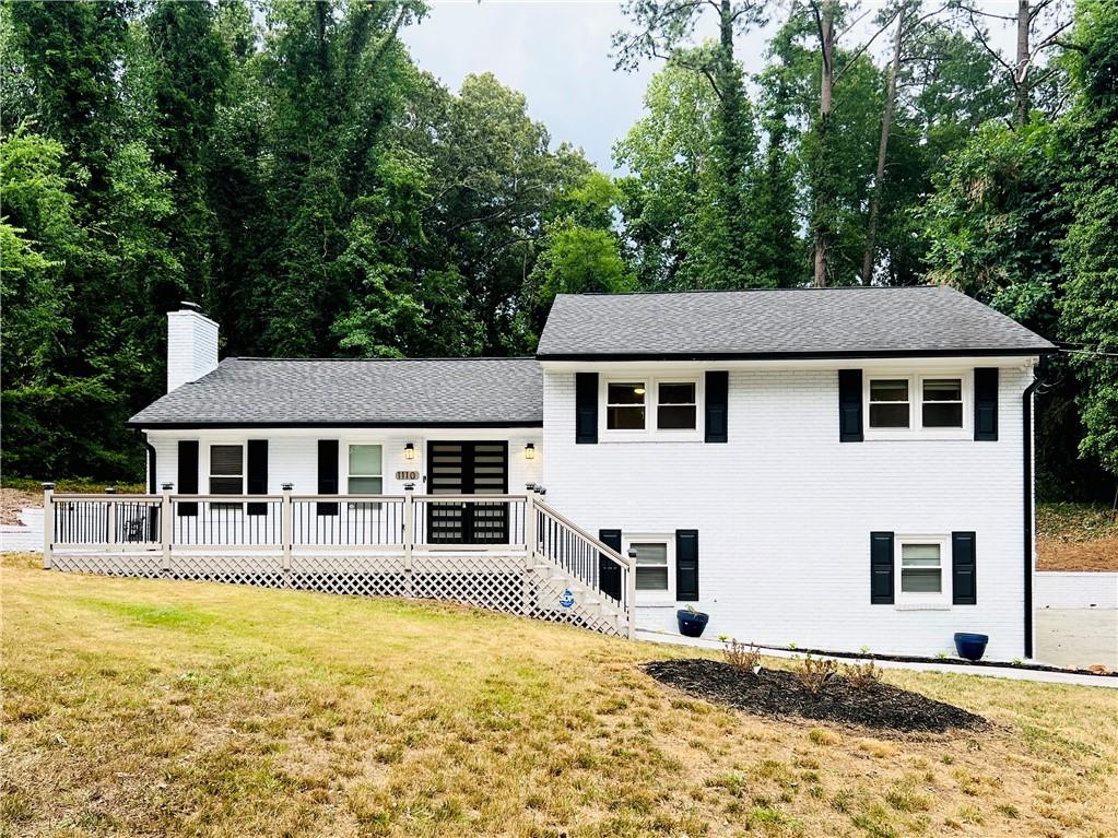 a front view of a house with swimming pool