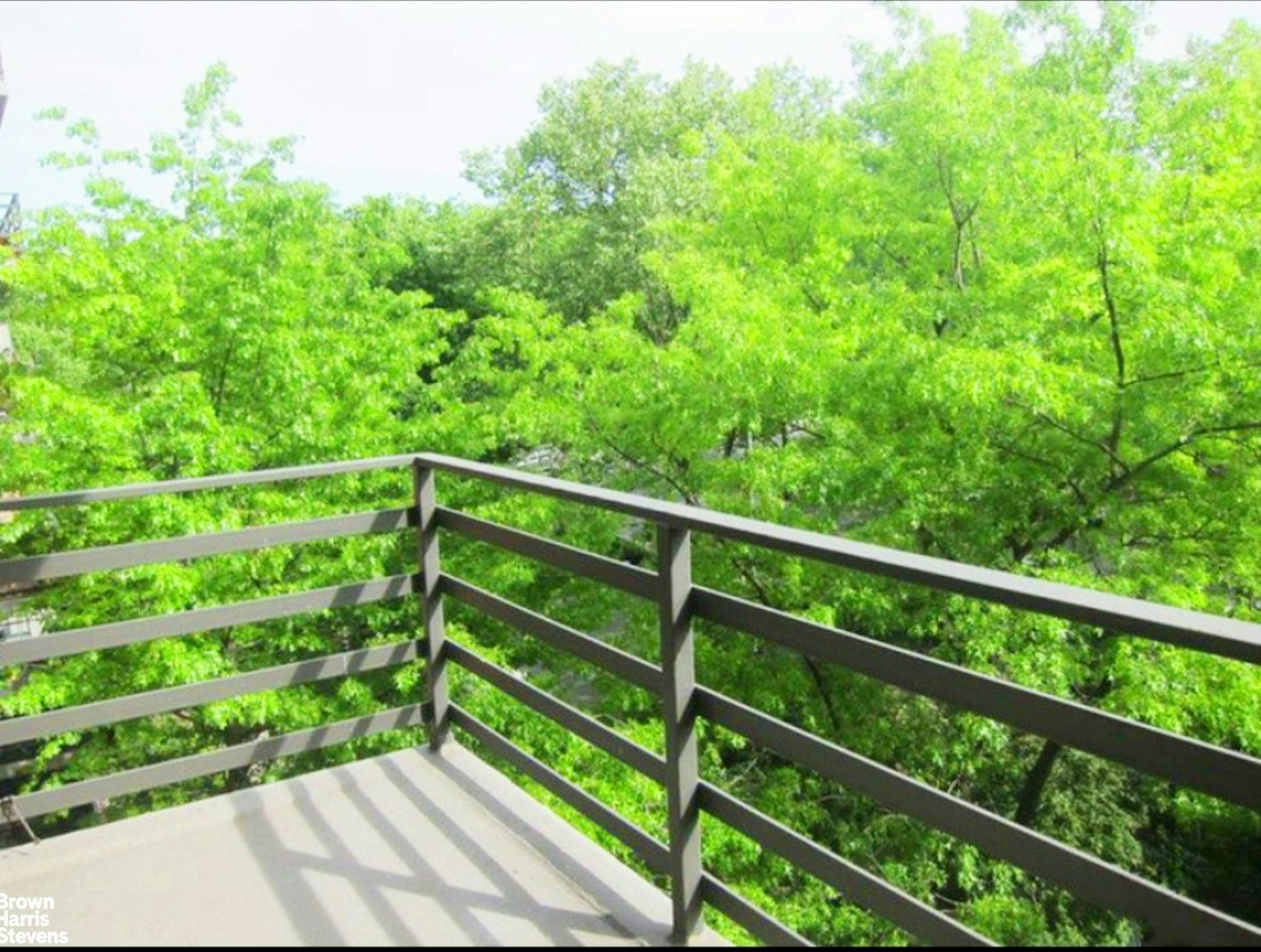 a view of a wooden fence