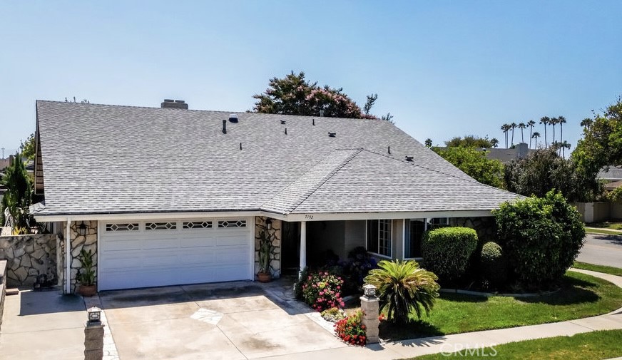 a front view of a house with yard