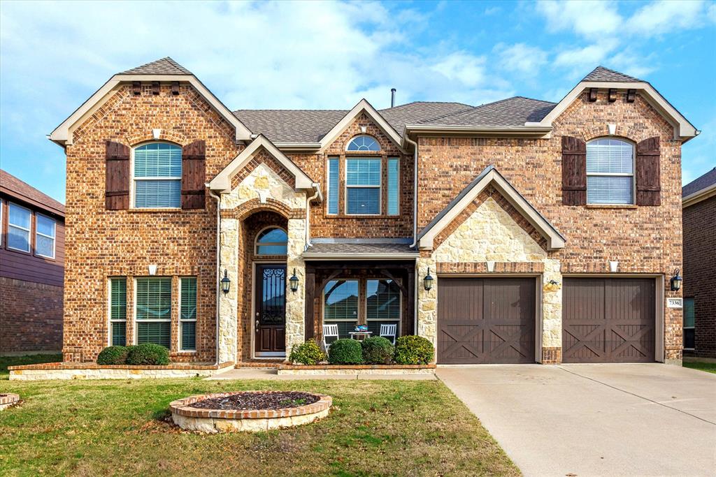 front view of a house with a yard