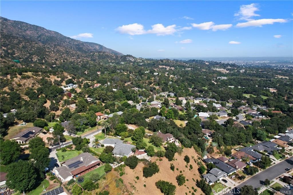 an aerial view of a city with lots of residential buildings