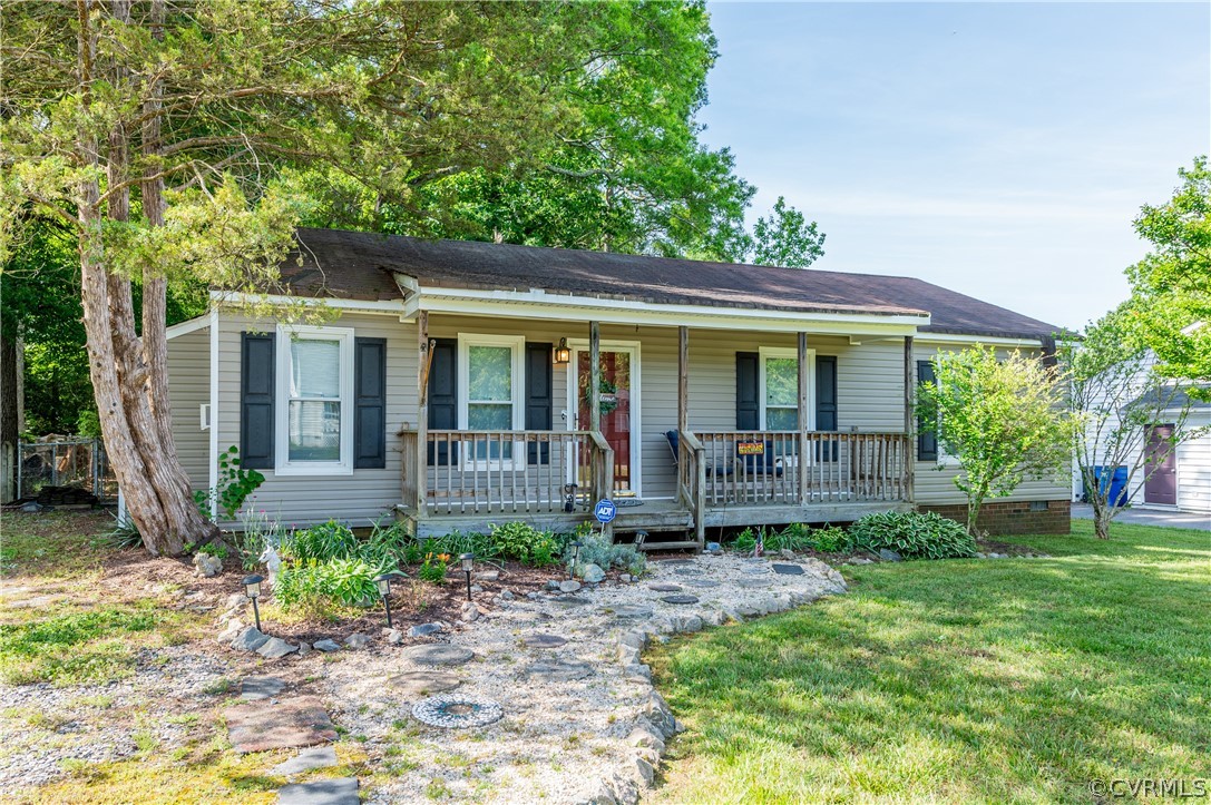 front view of a house with a yard