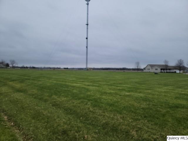 a view of a big yard with an outdoor space