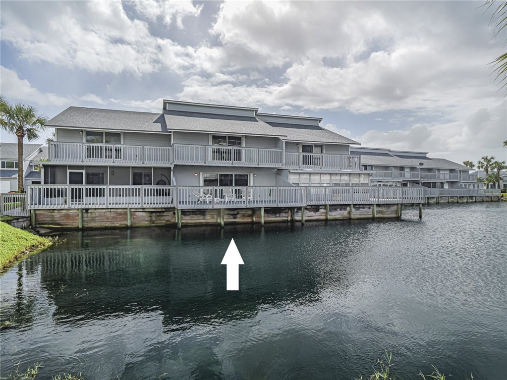 a view of a lake with building in front of it