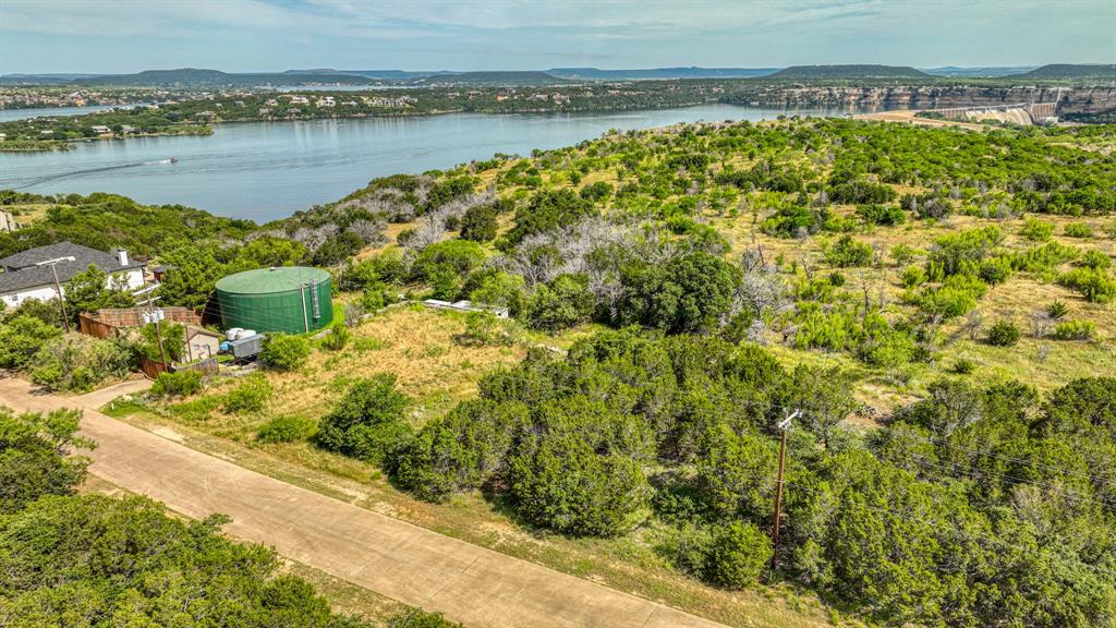 a view of a lake with a big yard