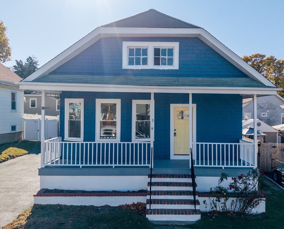 a front view of a house with a porch