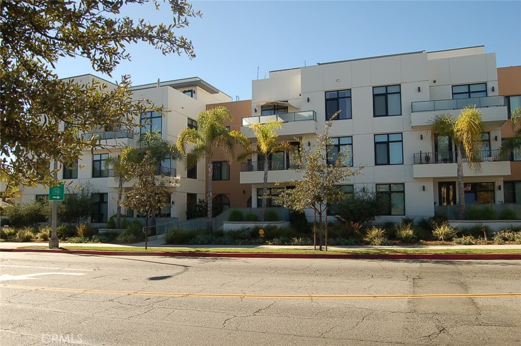 a front view of a building with street view