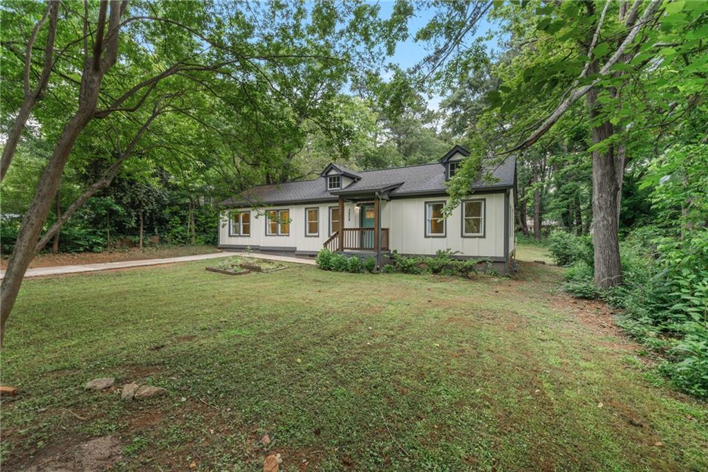 a house view with a garden space