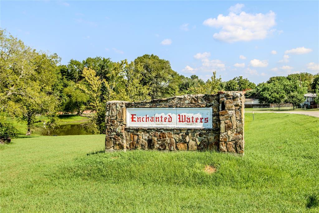 2 Manufactured Homes that sit on their own lot in Enchanted Waters on Lake Conroe.